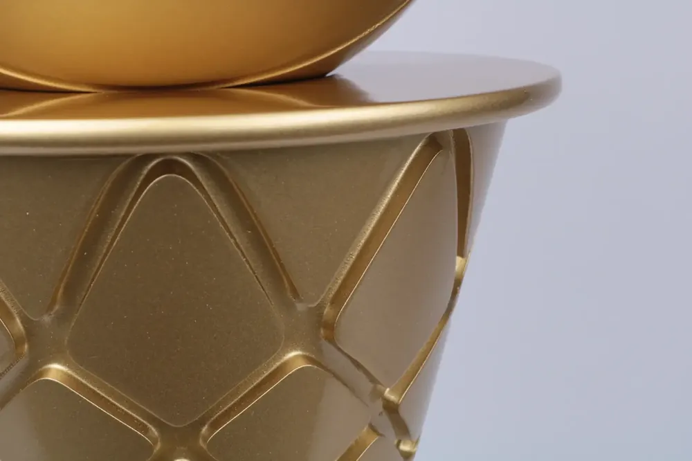 Macro detail of a faceted gold trophy surface