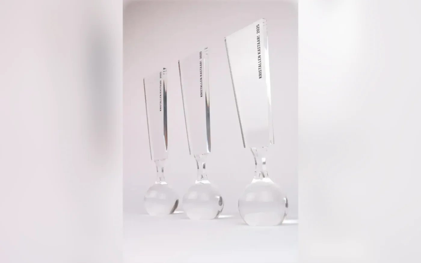 Transparent lucite deal toys with an embedded design